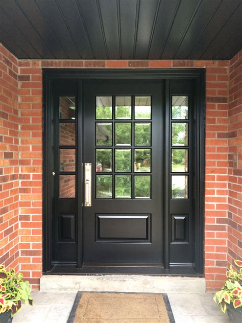 richly black stained solid mahogany amberwood custom door   divided lights