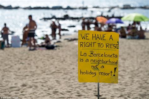 Dozens Of Anti Tourist Protesters Storm Barcelona Beach