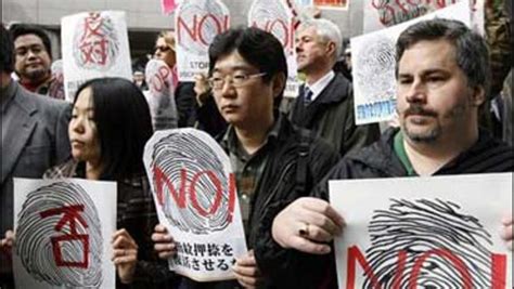 japan to fingerprint foreigners cbs news
