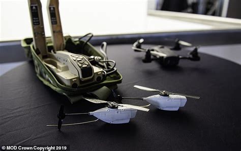 uk troops    palm sized drones  monitor enemies   battlefield daily mail