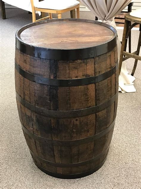 reclaimed barrels  add rustic flair   event perfect  cocktail tables accent pieces