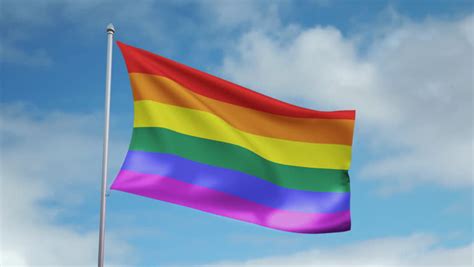 looping movie of beautifully colored lgbt flag waving in the wind with