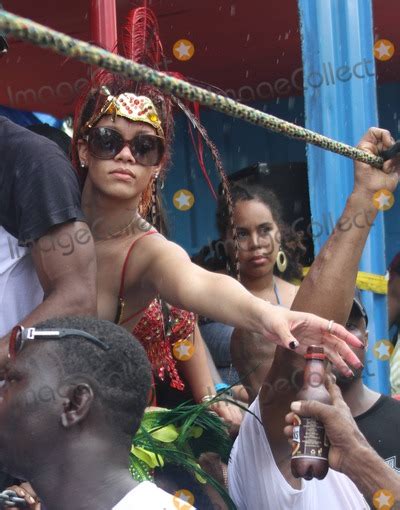 photos and pictures rihanna appears on a float in a parade in the