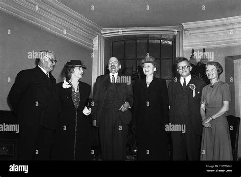 clement attlee with his wife violet centre herbert morrison with his