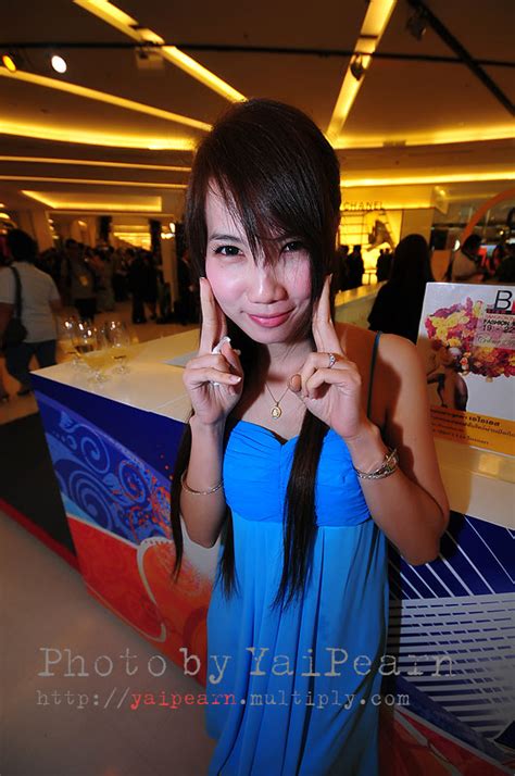 pretty thai lady presentor drinking products page milmon