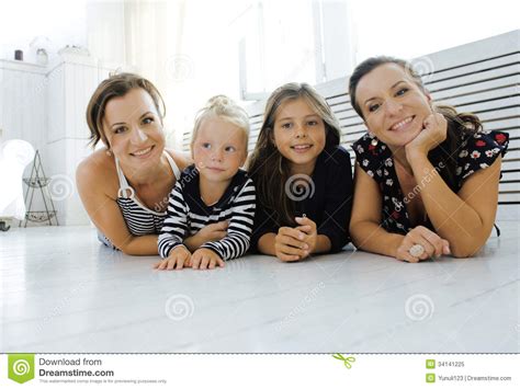 mature sisters twins at home with little daughter stock image image