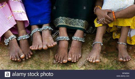 Four Indian Girls Legs Arms And Feet With Ankle Bracelets