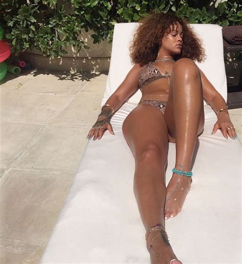 Rihanna Shows Off Her Sexy Curves As She Relaxes After