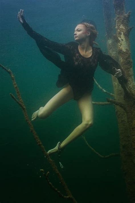 women underwater air