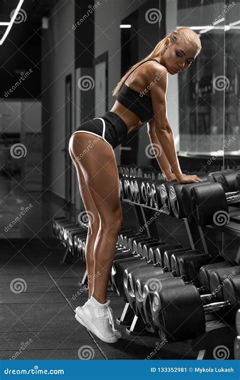 Athletic Girl Working Out In Gym Fitness Woman Doing Exercise Stock