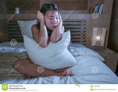 Sad And Depressed Asian Korean Woman In Bed Suffering Depression