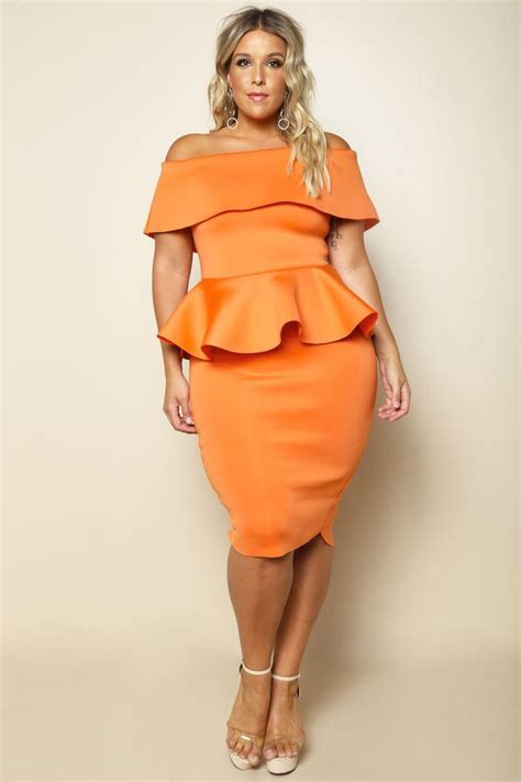 a alluring and effortlessly glam plus size dress features a striking peplum waist off shoulder