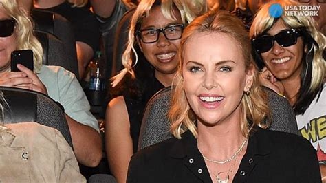 Comic Con Charlize Theron Is Ready To Kick Butt In Thigh High Boots