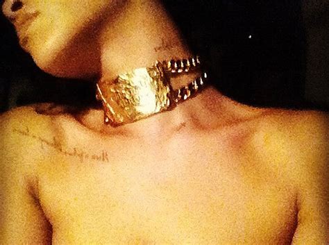 chris brown shares intimate photo of rihanna as she tweets topless