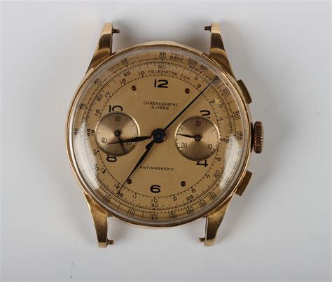 chronographe suisse ct gold cased gentlemans chronograph wristwatch  signed champagne