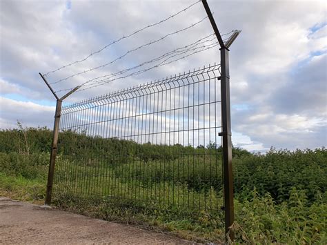 galvanized  mesh panel  brown barbed wire lewandowski fence