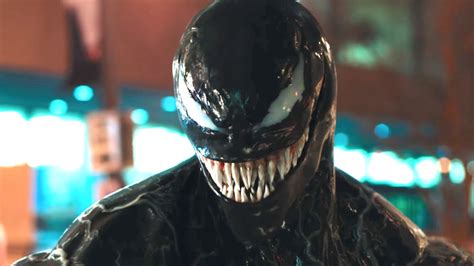 venom takes over tom hardy s luscious lips in new trailer mtv