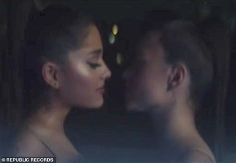 ariana grande teases girl on girl kiss in her new music video
