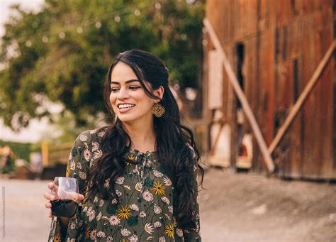 pretty latina woman in wine country by stocksy contributor jayme