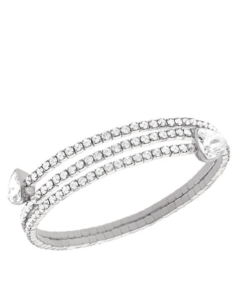 swarovski twisty silver tone crystal triangle bangle bracelet  metallic lyst