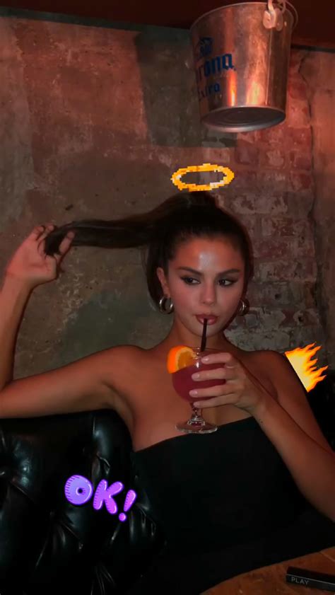 Pop Minute Selena Gomez Strapless Drink Photos Photo 3