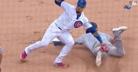 watch javier baez pulls off unbelievable no look tag cubshq