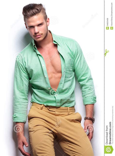 casual man with unbuttoned shirt royalty free stock image