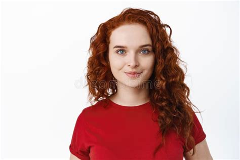 Close Up Of Ginger Girl With Curly Hair And Natural Light Make Up