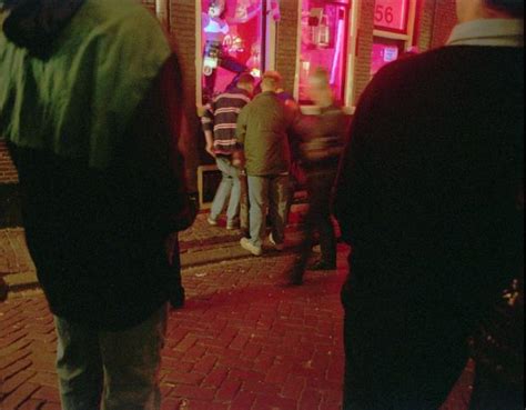 amsterdam s red light district places ban on tourists staring at sex