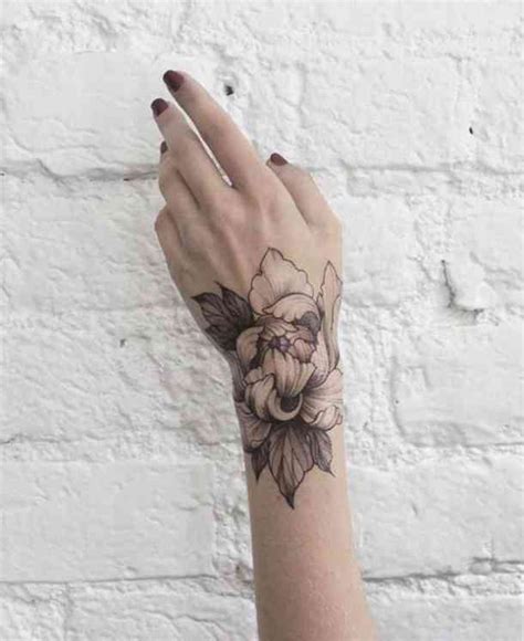 50 Best Dotwork Tattoos And Minimalistic Tattoo Ideas Yourtango Hand