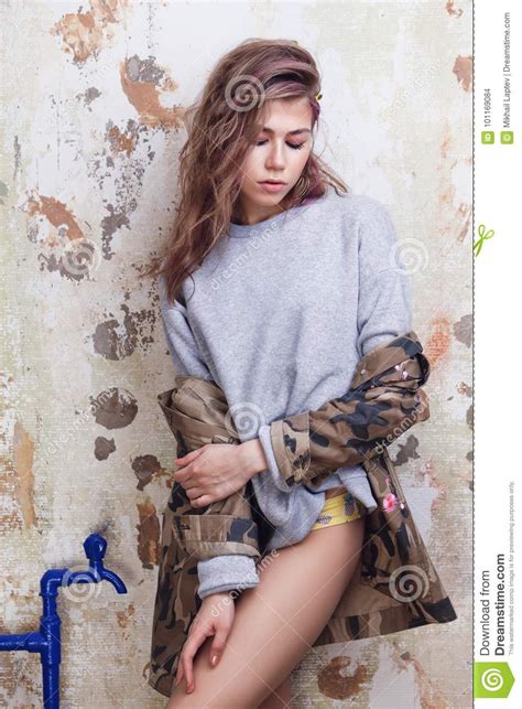 cool trendy girl posing stock photo image  legs gentle