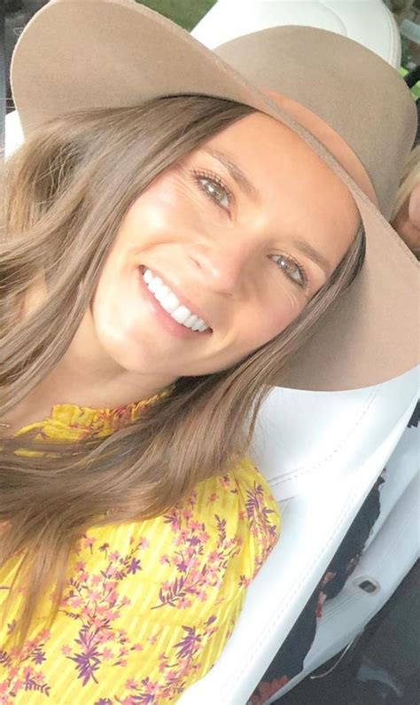 Danica Patrick Sexy Selfie In Hat And Yellow Celeblr