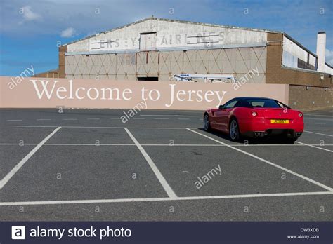 red ferrari parked  jersey airport   channel islands stock photo alamy