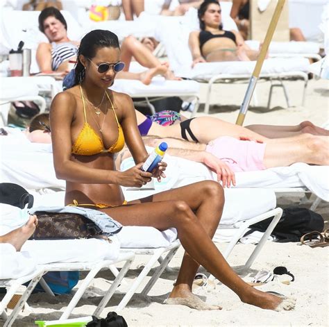 lais ribeiro in bikini sunbath at the beach in miami