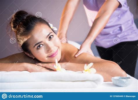 Thai Oil Massage To Beautiful Asian Woman Stock Image