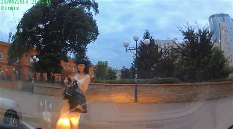 Drunk Woman Caught On Russian Dashcam Swaying Staggering In Circles On