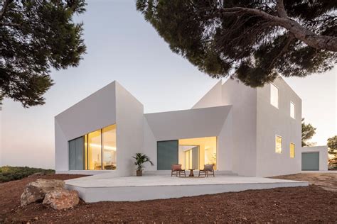 modern white minimalist exterior   home  softened   pastel design elements