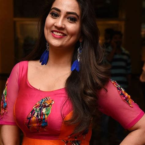 actress manjusha latest hot unseen photos in saree and backless blouse