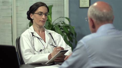 female doctor listening to patient stock video footage 00 14 sbv