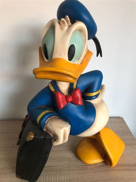 disney statue donald duck travelling  suitcase   catawiki