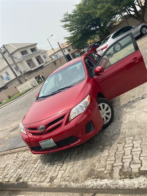 neatly   toyota corolla le red colour autos nigeria