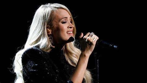 carrie underwood on ‘elvis all star tribute wows in black dress