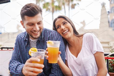 fun couple drinking beer together high quality people