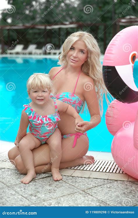 summer family vacation fashion  blond girls portrait stock photo