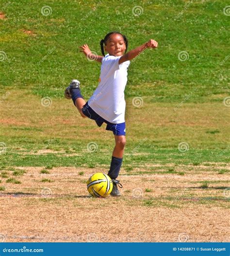 kicking  ball girls soccer editorial photo image