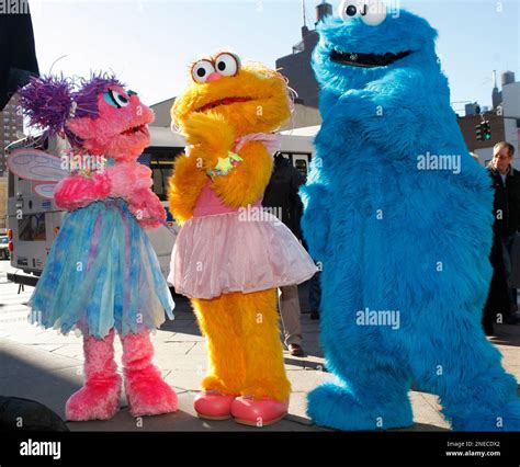 Characters From Sesame Street Live Appear On The Street By Madison