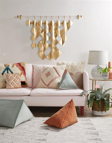gold wall hanging  pink sofa bda decor  couch diy wall design brass wall art