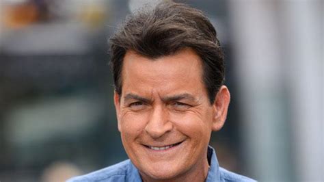 charlie sheen to report he s hiv positive