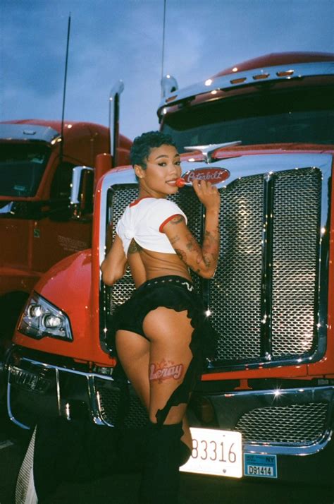 Coi Leray Posing In Front A Truck With A Lollipop Cufo510