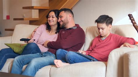 family watching tv  digital tablet  stock footage sbv  storyblocks